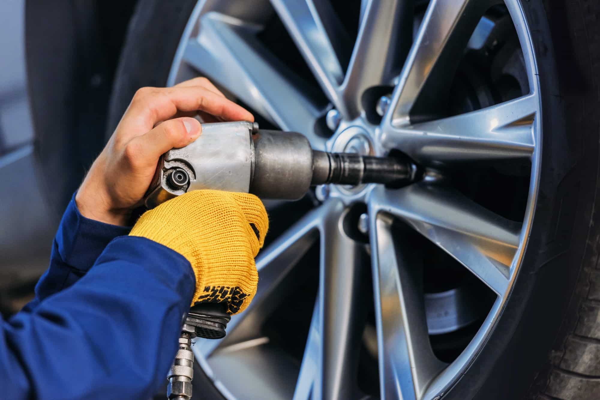 A skilled mechanic working on tires and wheels