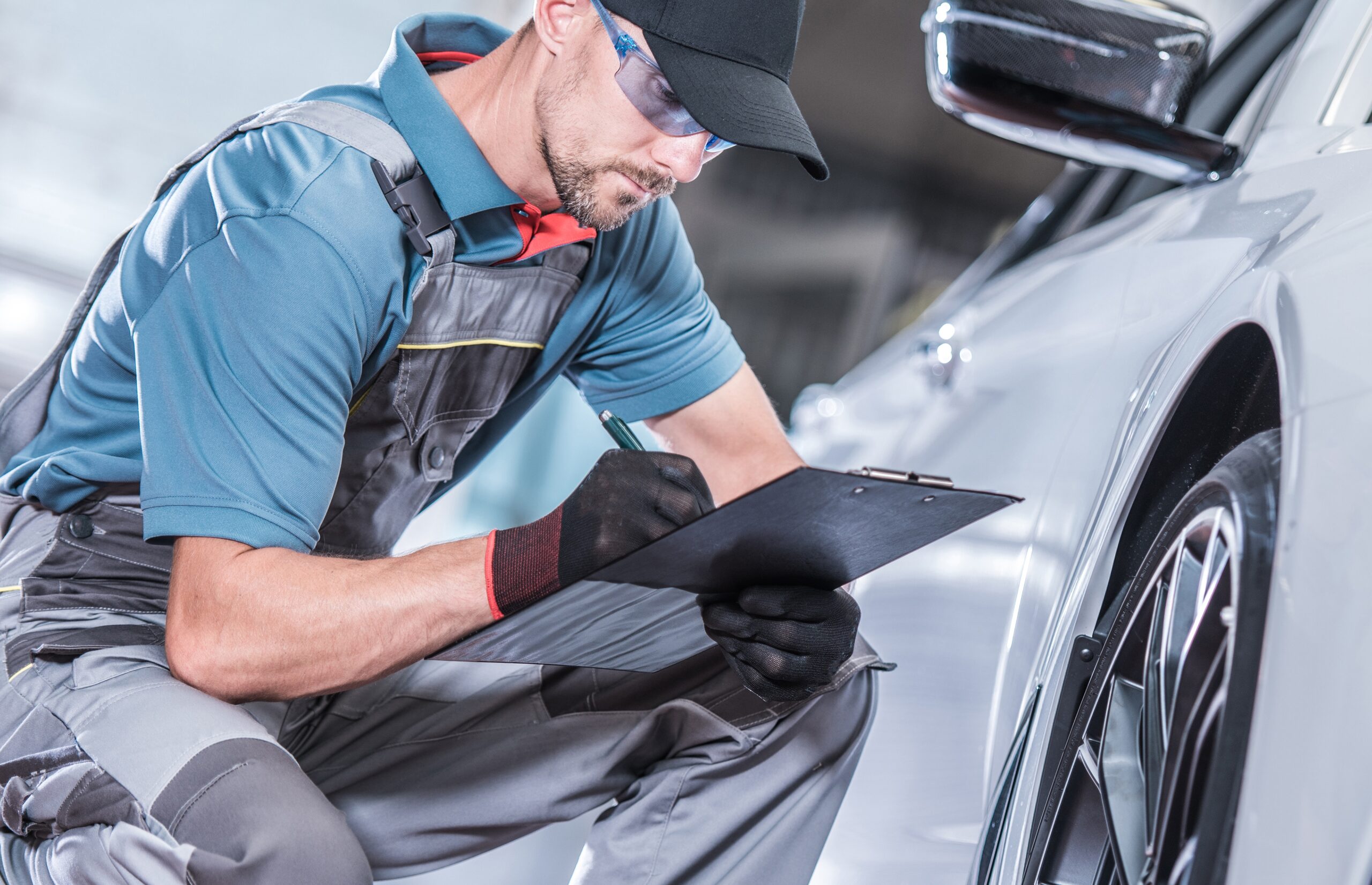 An experienced mechanic conducting thorough vehicle maintenance.